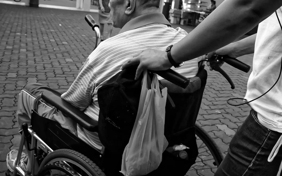 wheelchair, elderly, man, pushed, carer, black and white photo